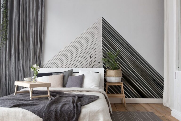 Fototapeta z minimalistycznym wieżowcem i nowoczesną architekturą miejską.